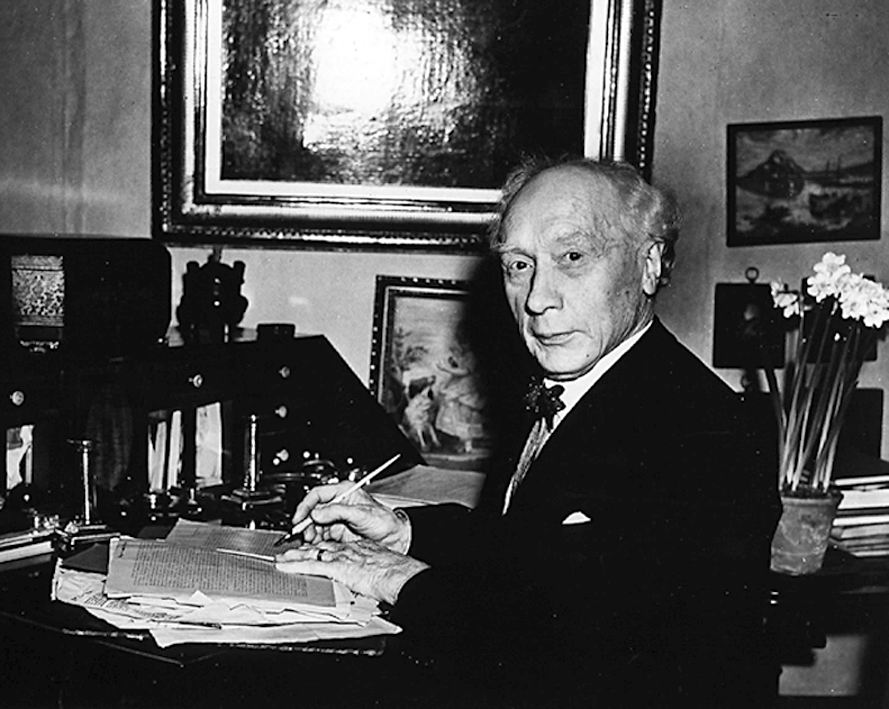 FM Alexander writing at his desk. Alexander Technique books